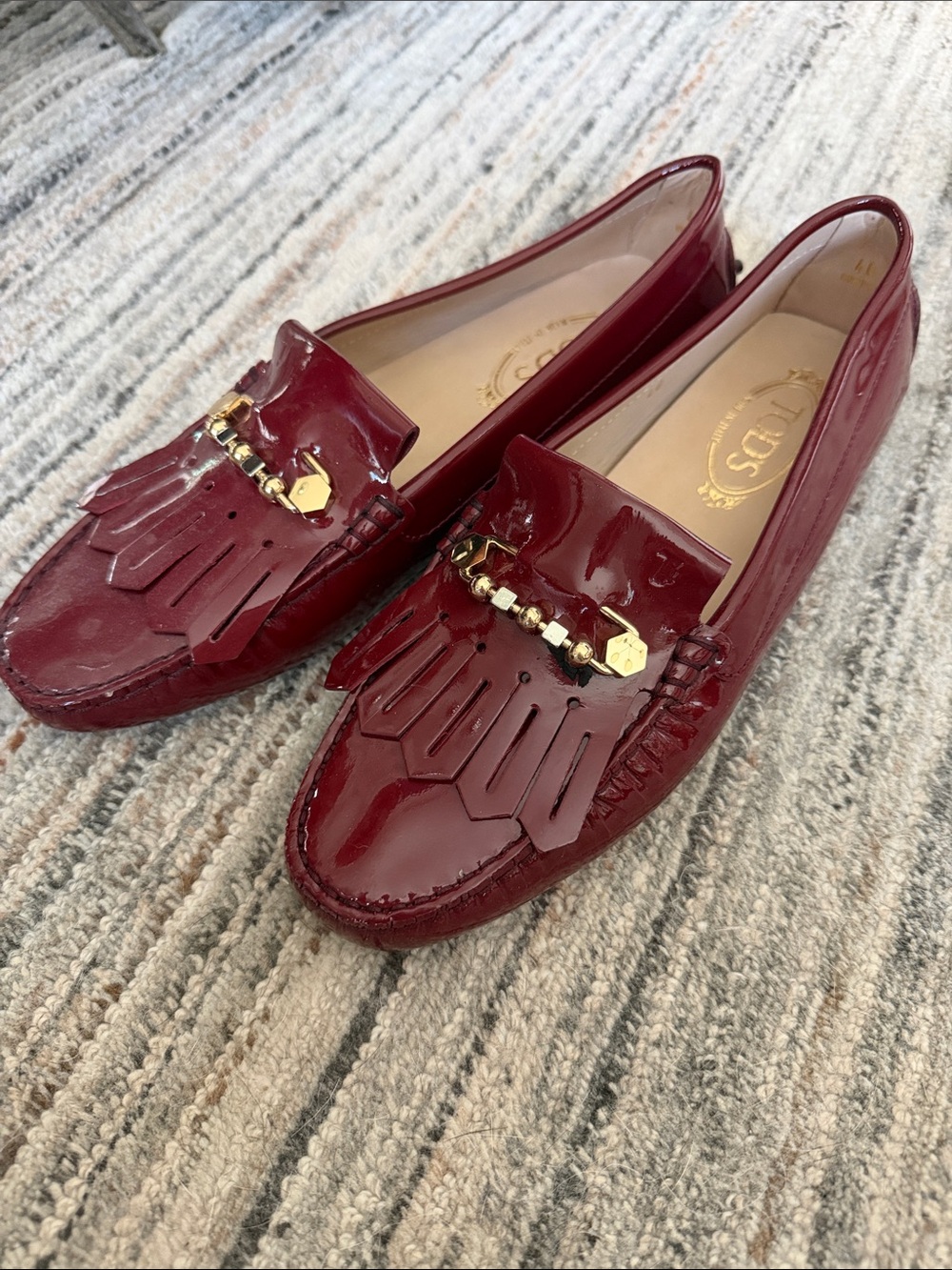 Tod's Patent Leather Kiltie Loafers in Burgundy